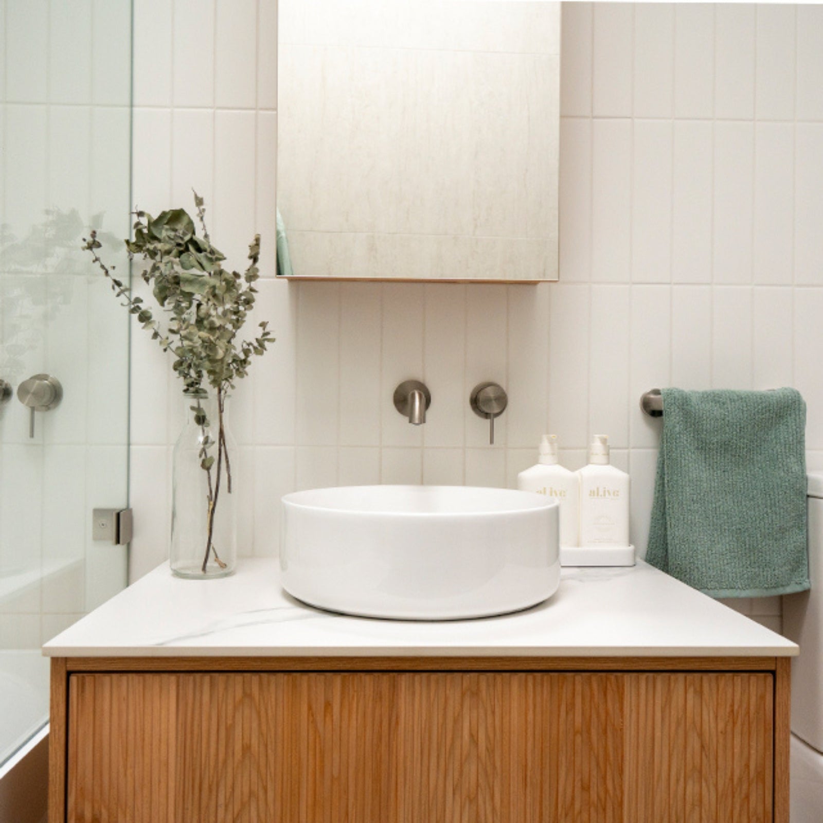 cam and jules family bathroom x the blue space, nero brushed nickel mecca tapware, ingrain vanity