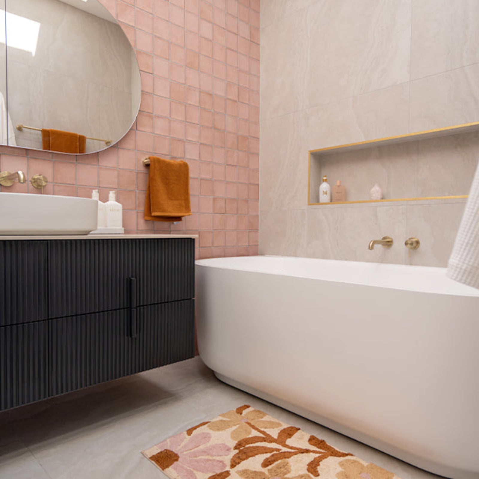 Nero Mecca brushed gold bath spout and mixer tap, bao bath tub, pink dianna tiles and Ingrain vanity in pink cam and jules bathroom collaboration
