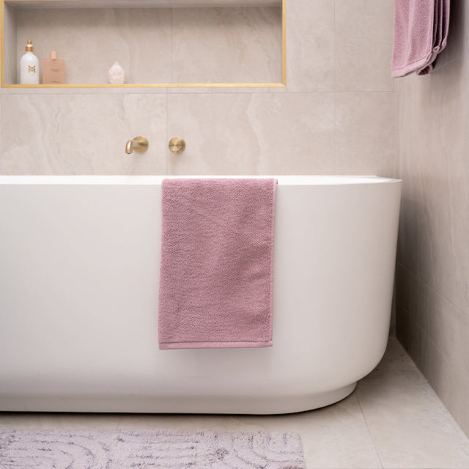 Nero Mecca brushed gold bath spout and mixer tap with Bao back to wall bath in pink cam and jules bathroom collaboration
