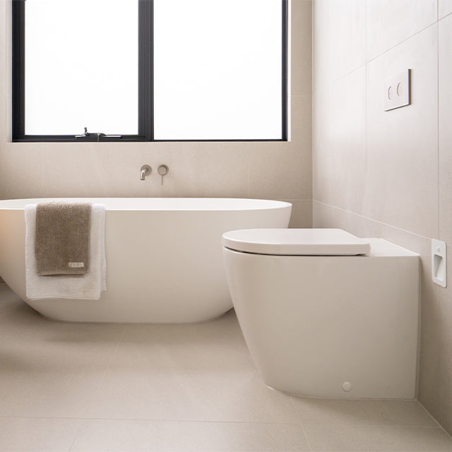 Caroma Liano brushed nickel bath taps | Caroma Liano Toilet| Modern Melbourne Bathroom Renovation | The Blue Space