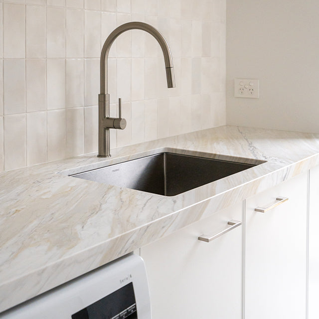Caroma Liano brushed nickel laundry and kitchen taps | Modern Laundry Renovation | The Blue Space