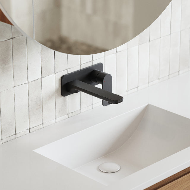 Caroma Luna Lead Free Wall Basin/Bath Mixer Black on white textured subway tile feature wall