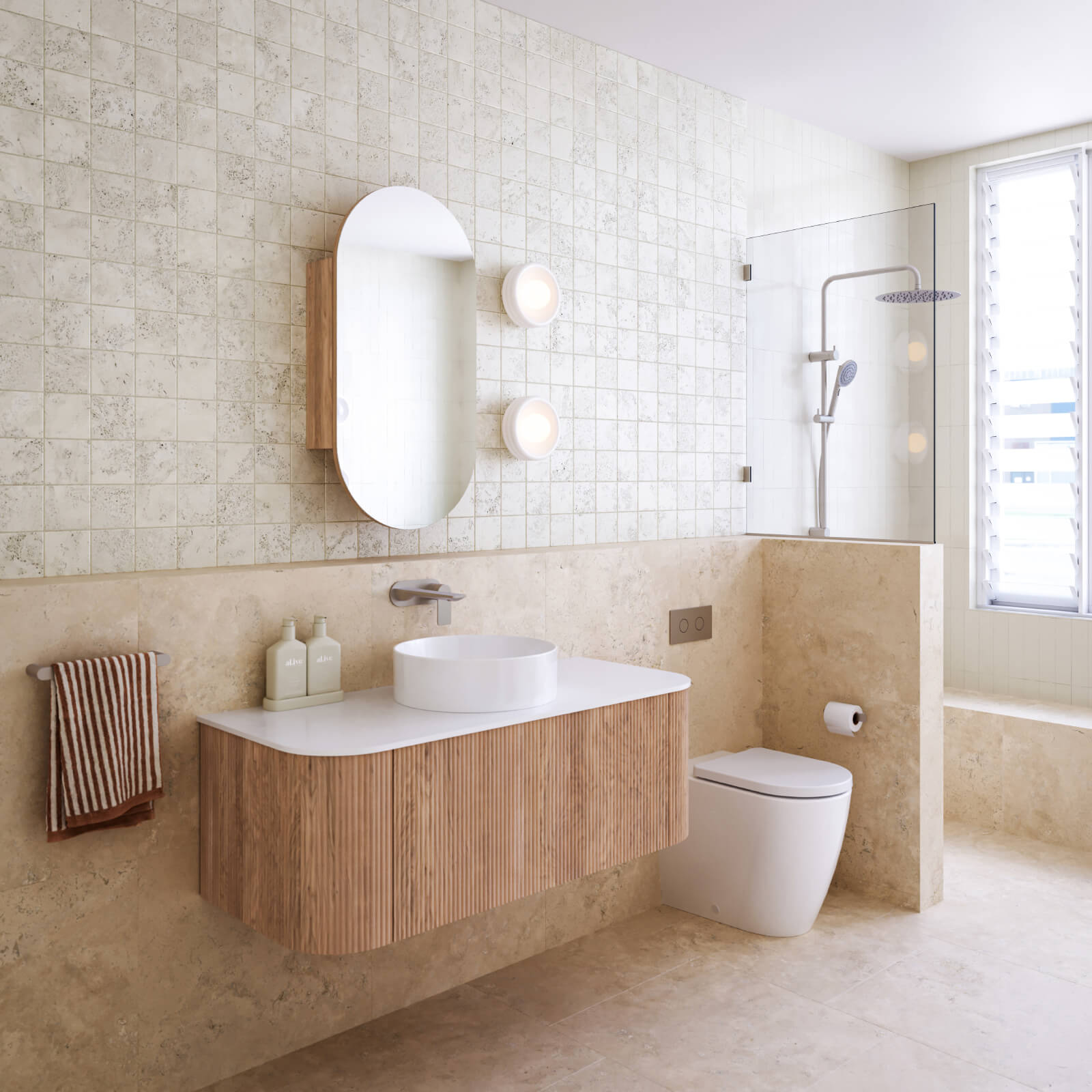 Caroma Liano brushed nickel taps, accessories, shower and Urbane II Cleanflush toilet suite | Timberline shaving cabinet | Modern Bathroom Renovation | The Blue Space