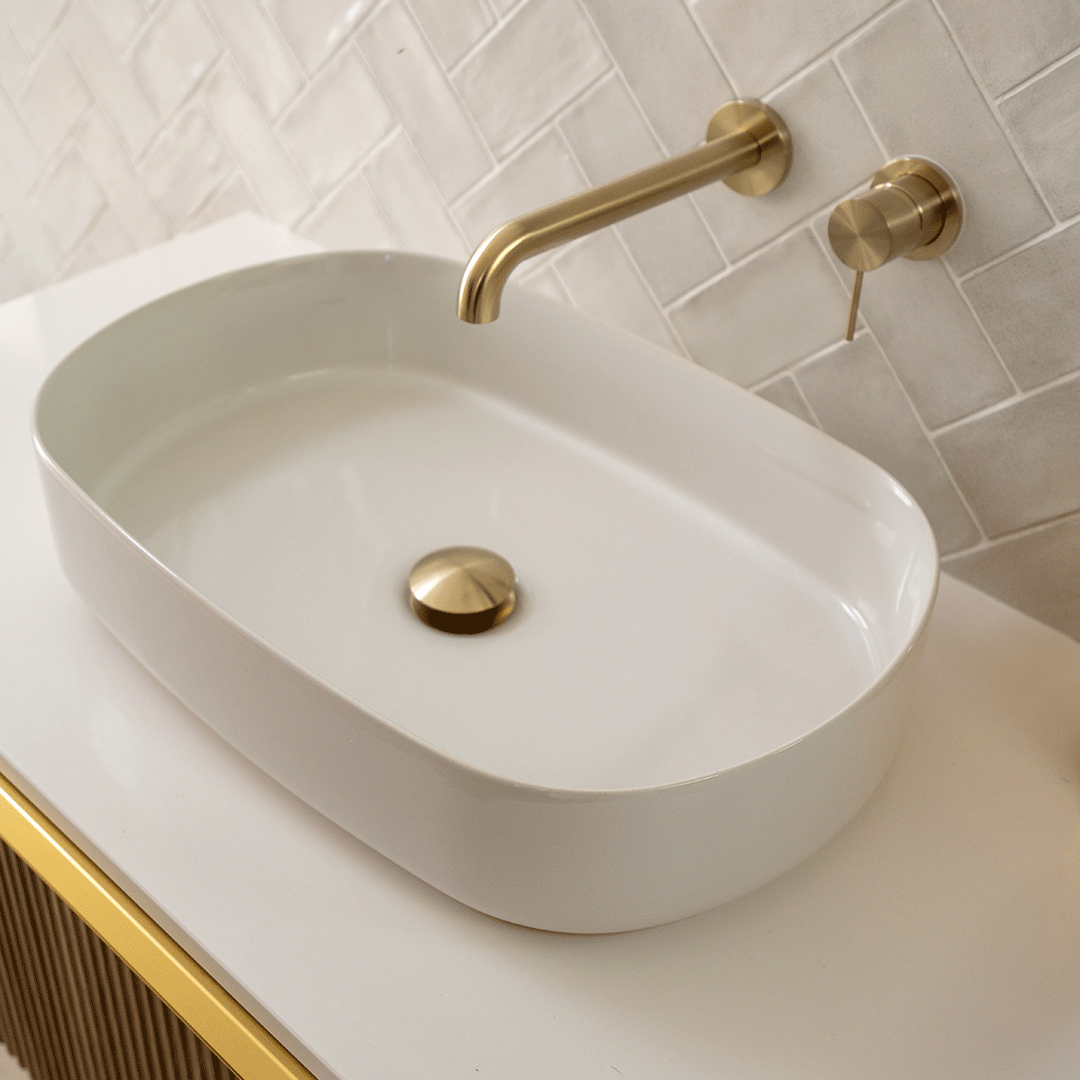 {"type":"root","children":[{"type":"paragraph","children":[{"type":"text","value":"The elegance of Nero brushed gold taps"}]}]}